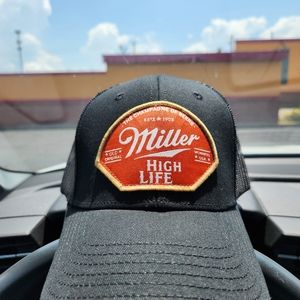 Authentic miller Cap. With adjustable band.